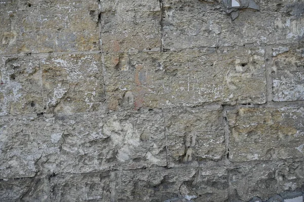 Eski kirli duvar kapanıyor. Grunge soyut fotoğraf arkaplanı. Güzel taş dokusu deseni. İşlem sonrası ve tasarım için iyi