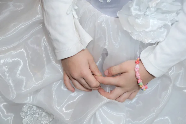 Two Little Hands and Gown — Stock Photo, Image