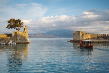 Amazing sunset of the port of Nafpaktos town clipart