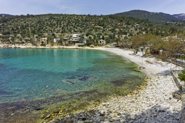 Panoramic view to village and beach of Aliki, Thassos island,  Greece   clipart
