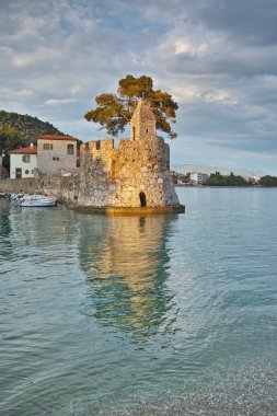 Amazing sunset of the port of Nafpaktos town clipart