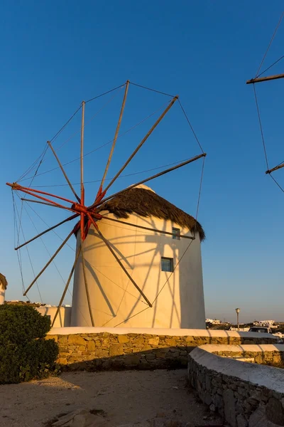 Sunset over White windmills on the island of Mykonos, Cyclades — Stock Photo, Image