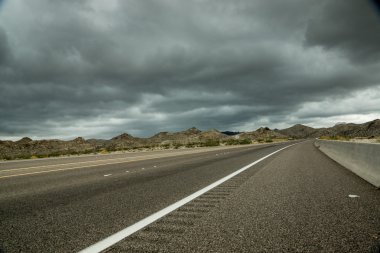 Dark Clouds, Desert Highway clipart