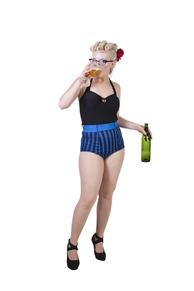 Woman in pin-up dress drinking - Isolated Stock Picture