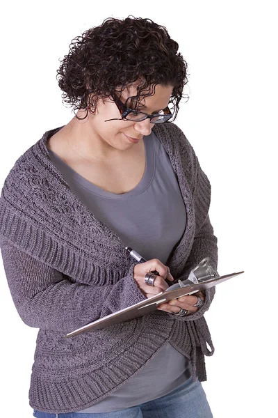 Beautiful Hispanic Woman With a Clipboard Stock Image