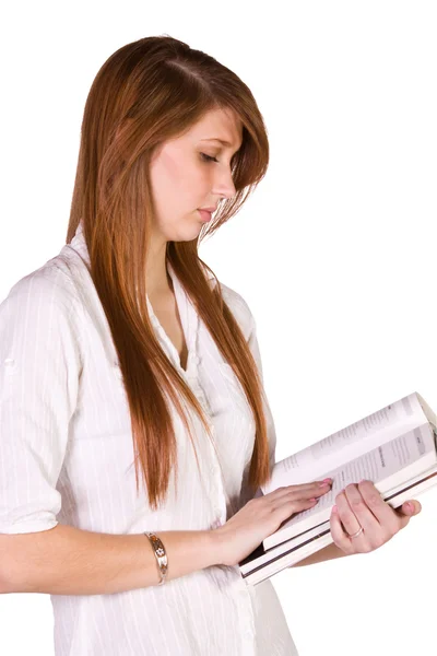 Симпатичная девушка с книгами и журналом в руках — стоковое фото