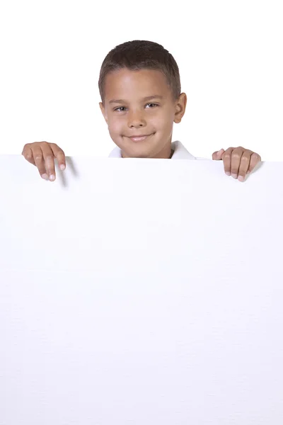 可爱的小男孩抱着一个空白的标志 — 图库照片