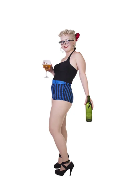 Woman in pin-up dress drinking — Stock Photo, Image