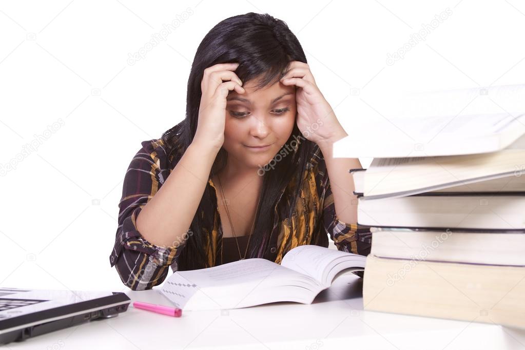 Young student studying for exams