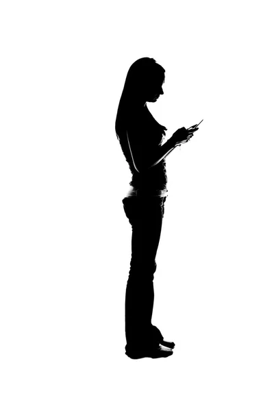 Silhouette isolata di una bella ragazza sms — Foto Stock