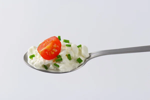 Spoon of cottage cheese — Stock Photo, Image