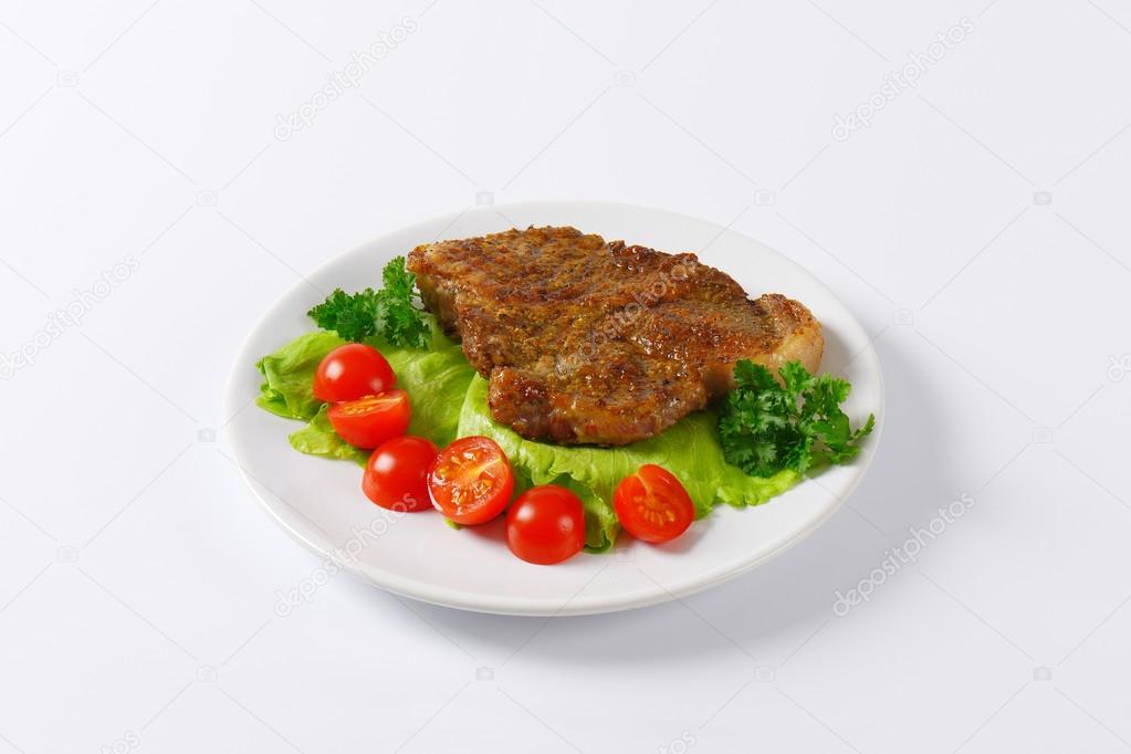 marinated pork steak with vegetebles