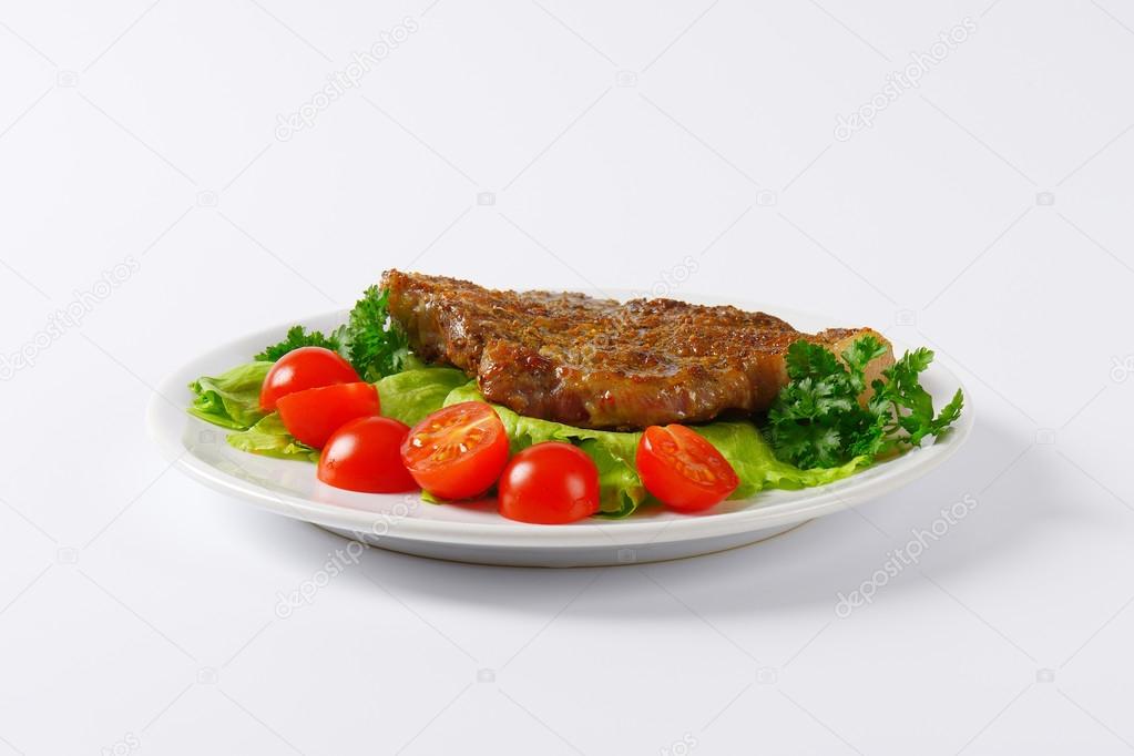 marinated pork steak with vegetebles