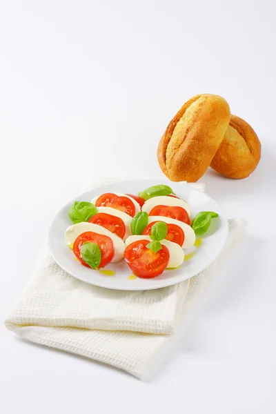 Caprese salad with French bread — Stock Photo, Image