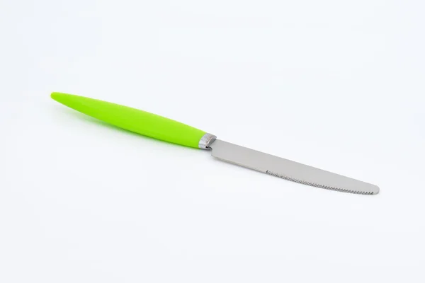 Tabela nóż z zielony uchwyt z tworzywa sztucznego — Zdjęcie stockowe