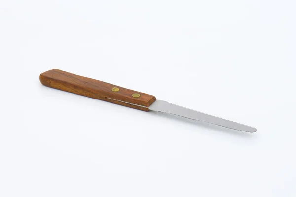 Wooden-handled serrated knife — Stock Photo, Image