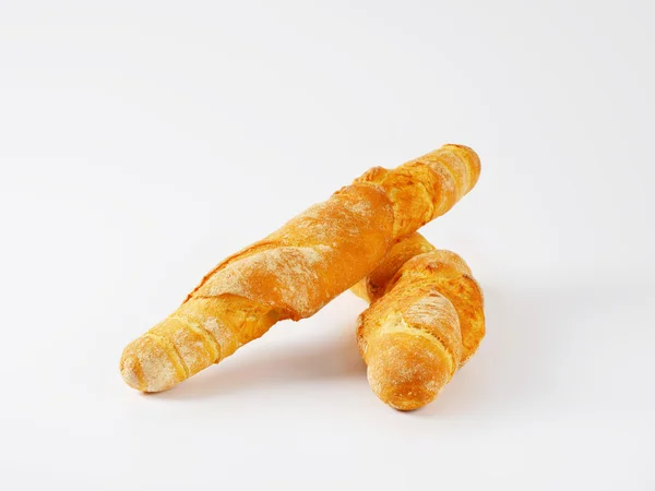 Two thin crispy baguettes — Stock Photo, Image