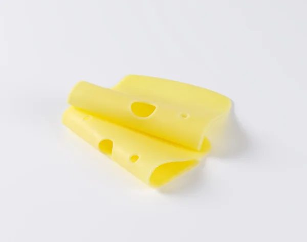 Plakjes van Zwitserse kaas — Stockfoto