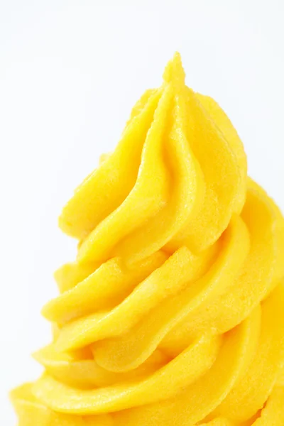Yellow cream swirl — Stock Photo, Image