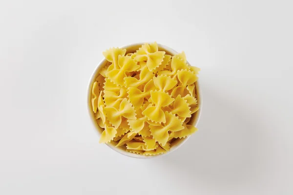 Uncooked bow tie pasta — Stock Photo, Image