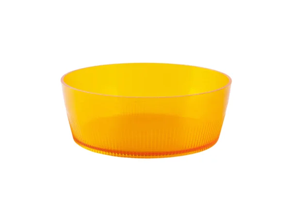 丸いオレンジ色のプラスチックのお皿 — ストック写真