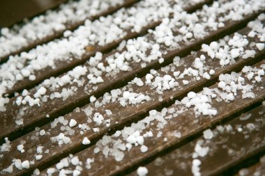 hailstones on wooden bench clipart