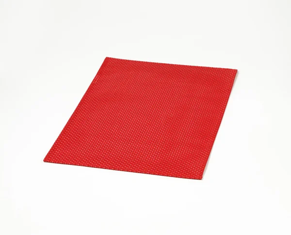 赤いプラスチック製プレース マット — ストック写真