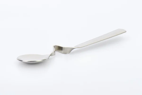 Bent metal spoon — Stock Photo, Image