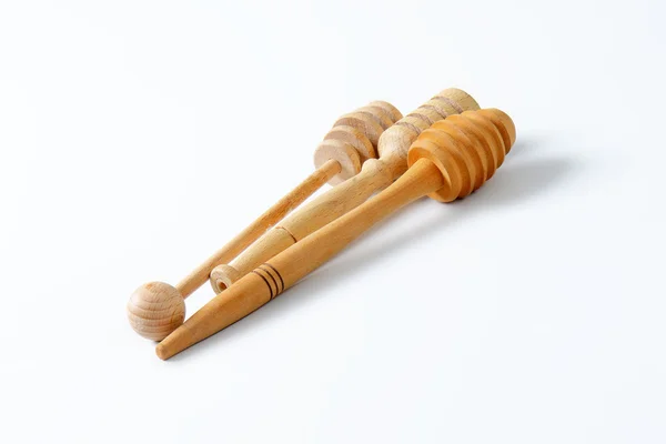 Wooden honey dippers — Stock Photo, Image