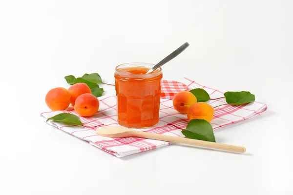 Jar of apricot jam — Stock Photo, Image