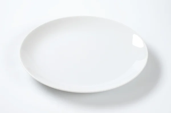 흰색 접시 모양의 쿠데타 — 스톡 사진