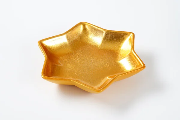 Tigela em forma de estrela de ouro — Fotografia de Stock