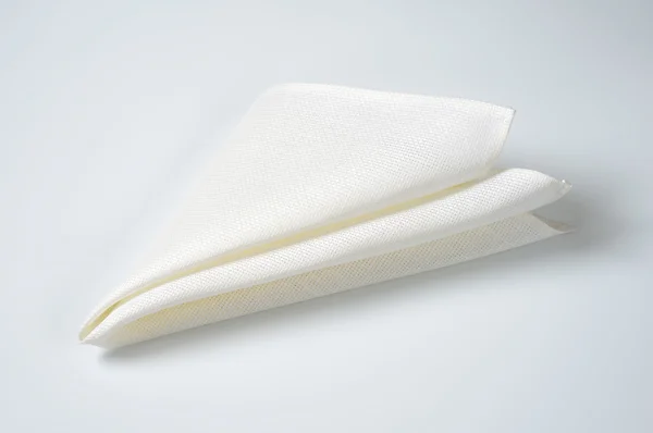 Folded white napkin — Stock Photo, Image