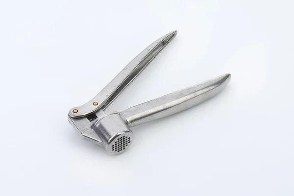 Metal garlic press — Stock Photo, Image