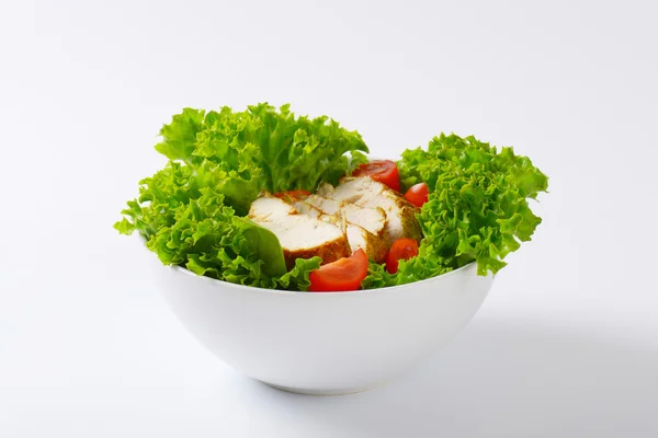 Spicy chicken breast with lettuce — Stock Photo, Image