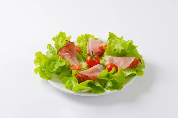 Lettuce and thin sliced Black Forest ham — Stock Photo, Image