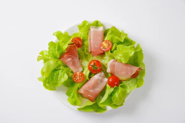 Lettuce and thin sliced Black Forest ham — Stock Photo, Image