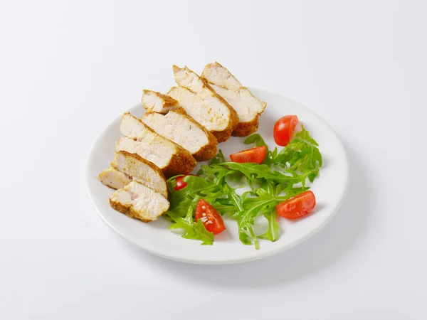 Spicy chicken breast with garnish — Stock Photo, Image