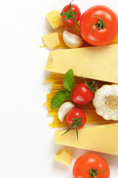 Parmesan cheese, vegetables and spaghetti — Stock Photo, Image