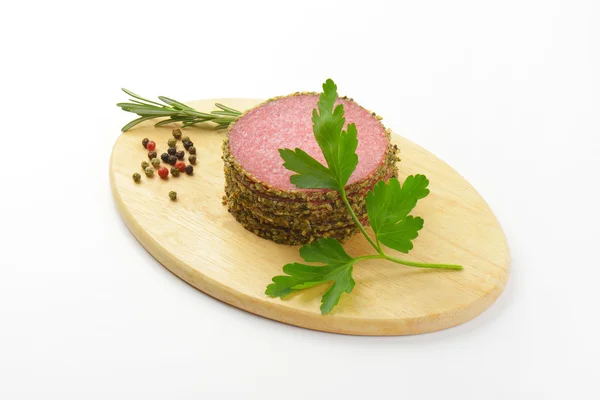 Pepper coated salami — Stock Photo, Image