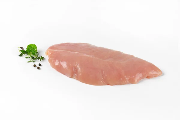 Raw turkey breast fillet — Stock Photo, Image