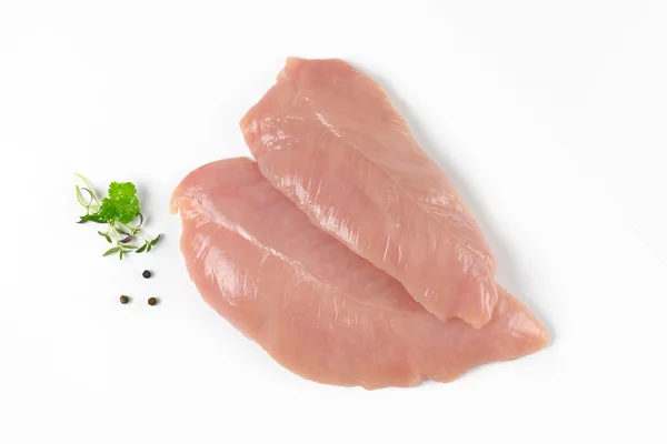 Raw turkey breast fillets — Stock Photo, Image