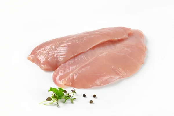 Raw turkey breast fillets — Stock Photo, Image