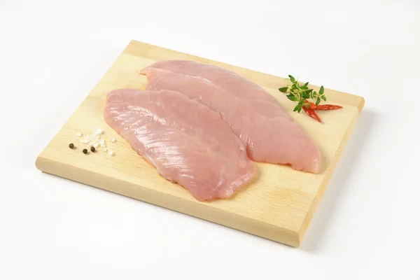 Raw turkey breast fillets — Stock Photo, Image