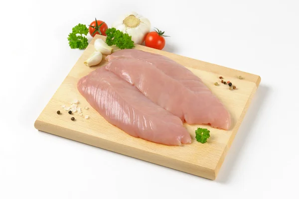 Raw turkey breast fillets — Stock Photo, Image