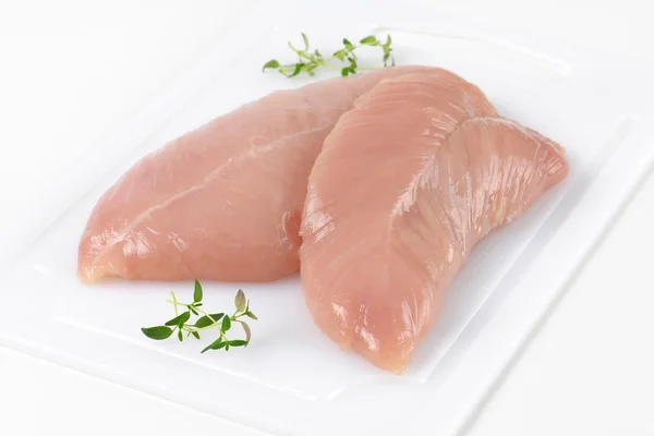 Raw turkey breast fillets — Stock Photo, Image