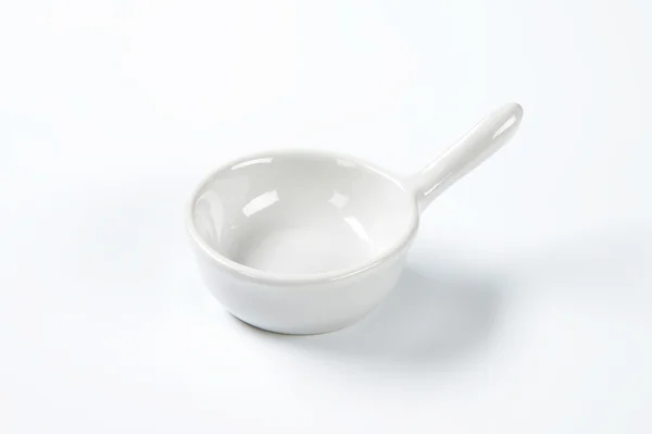 Ceramic dish with handle — Stock Photo, Image