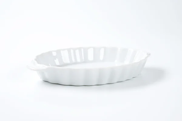 Oval fluted casserole dish — Stock Photo, Image