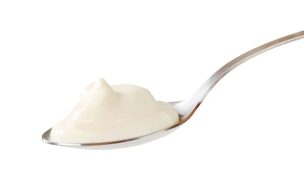 Joghurt auf einem Löffel — Stockfoto