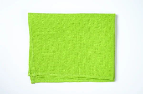 Сложенная зелёная салфетка — стоковое фото